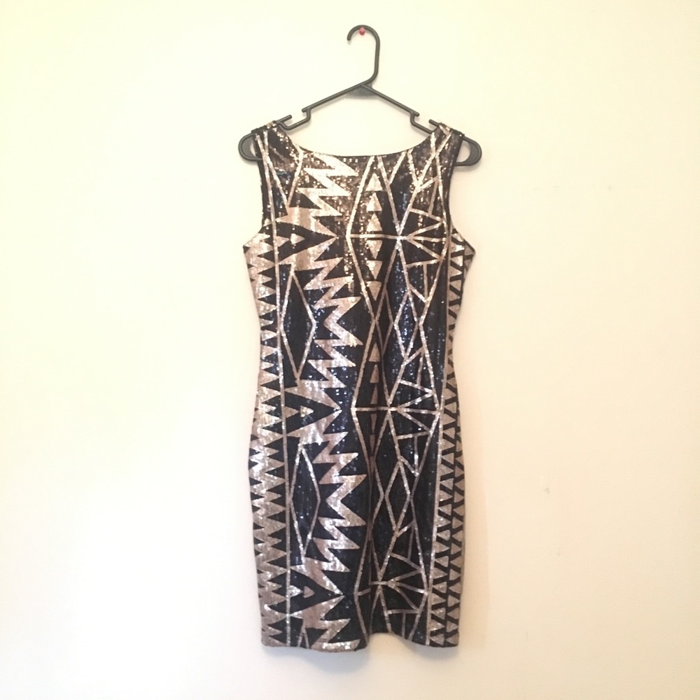 Black and gold sequined dress